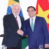 El primer ministro de Vietnam, Pham Minh Chinh, y el presidente de Brasil, Luiz Inácio Lula da Silva. (Fotografía: VNA)