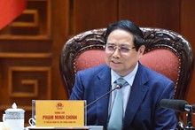 El primer ministro de Vietnam, Pham Minh Chinh, habla en la reunión. (Fotografía: Nhan Dan)