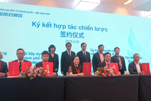 En la ceremonia de firma entre el NSSC y el CCPIT. (Fotografía: VNA)
