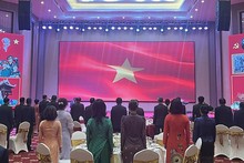 Los delegados de Vietnam y Laos en el evento (Foto: Nhan Dan)
