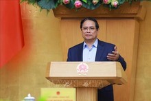 El primer ministro vietnamita, Pham Minh Chinh, habla en el evento. (Foto: VNA)