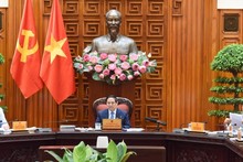 El primer ministro Pham Minh Chinh preside la reunión, (Foto: Nhan Dan)