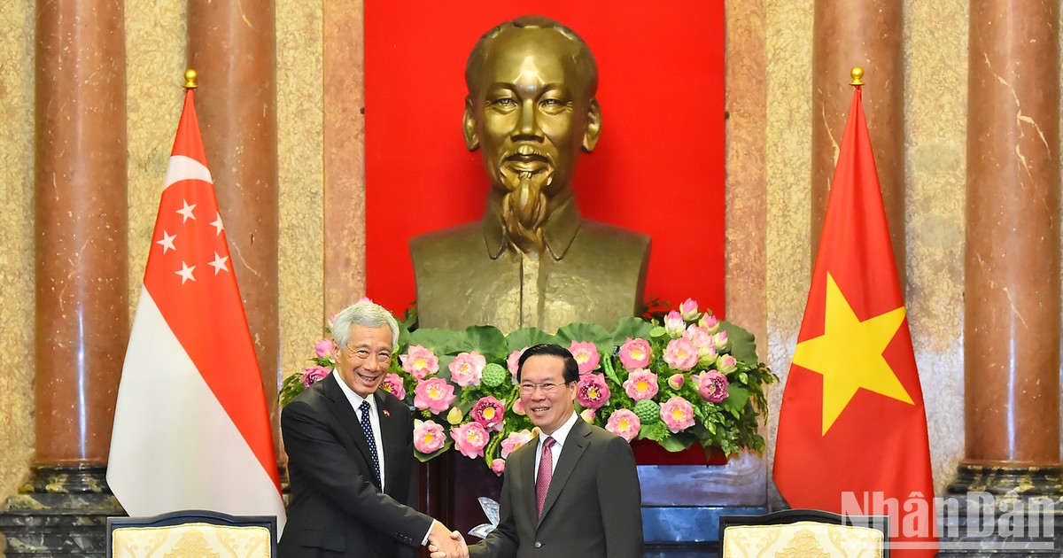 [Foto] Presidente de Vietnam sostiene encuentro con el premier singapurense