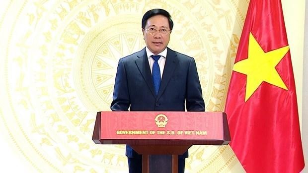 El vice primer ministro permanente de Vietnam, Pham Binh Minh, interviene en el acto. (Fotografía: VNA)
