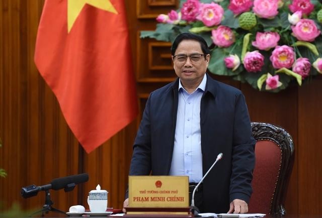 El primer ministro de Vietnam, Pham Minh Chinh, interviene en la cita. (Fotografía: VGP)