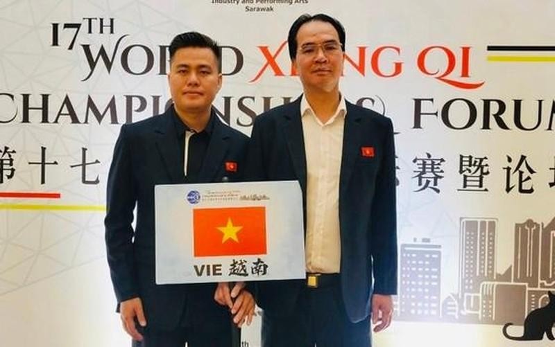 Los jugadores vietnamitas y chinos Nguyen Thanh Bao y Lai Li Xiong.