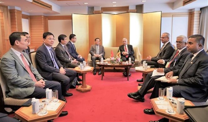 Reunión entre el viceprimer ministro vietnamita Tran Luu Quang y el presidente de Sri Lanka, Ranil Wickremesinghe. (Fotografía: VNA)