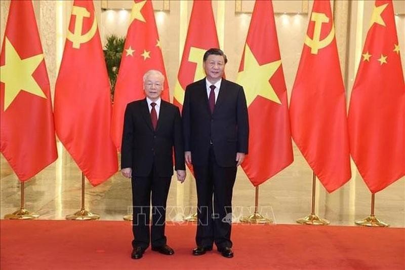 El secretario general del PCV, Nguyen Phu Trong y el secretario general del PCCh y presidente de China, Xi Jinping. (Fotografía: VNA)