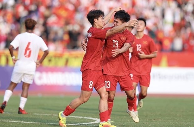 Jugadores vietnamita celebran su gol. (Foto: VNA)
