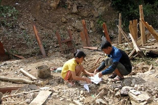 La casa de Moong Van Danh en la aldea de Binh Son 1, comuna de Ta Ca, distrito de Ky Son (Nghe An), fue arrastrada por inundaciones. (Fotografía: VNA)