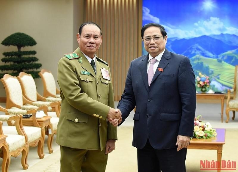 El primer ministro de Vietnam, Pham Minh Chinh, recibe al vice primer ministro y titular de Seguridad Pública de Laos, Vilay Lakhamhong. (Fotografía: Nhan Dan)