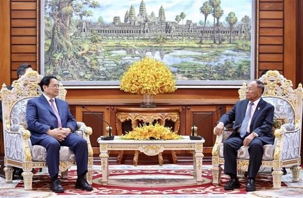 El primer ministro de Vietnam, Pham Minh Chinh, y el presidente de la Asamblea Nacional de Camboya, Samdech Heng Samrin. (Fotografía: VNA)
