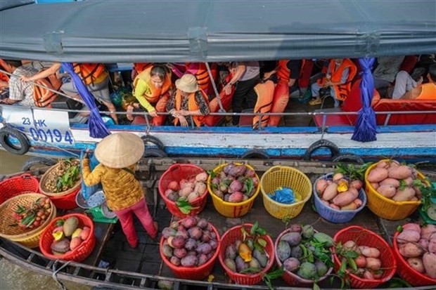 Mercado flotante de Cai Rang, en la sureña ciudad vietnamita de Can Tho. (Fotografía: VNA)