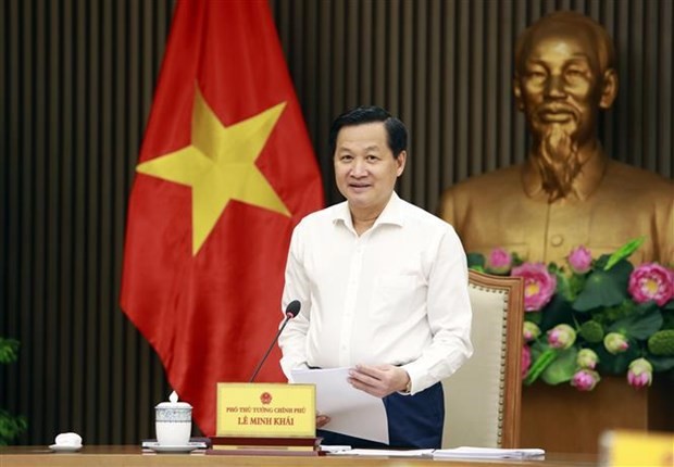 El vicepremier vietnamita Le Minh Khai interviene en la reunión. (Fotografía: VNA)