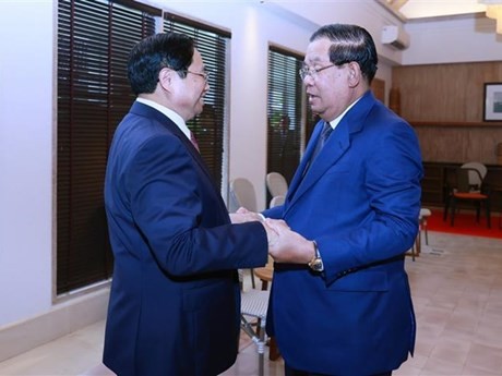 El primer ministro de Vietnam, Pham Minh Chinh, y su homólogo de Camboya, Samdech Techo Hun Sen. (Fotografía: VNA)