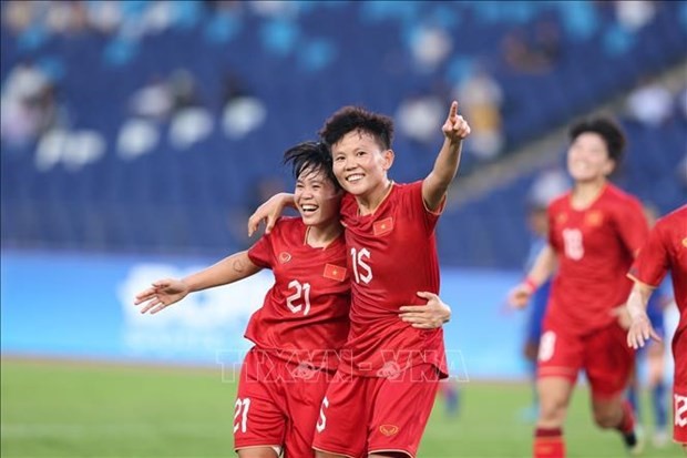 Jugadoras vietnamitas celebran el segundo gol. (Fotografía: VNA)
