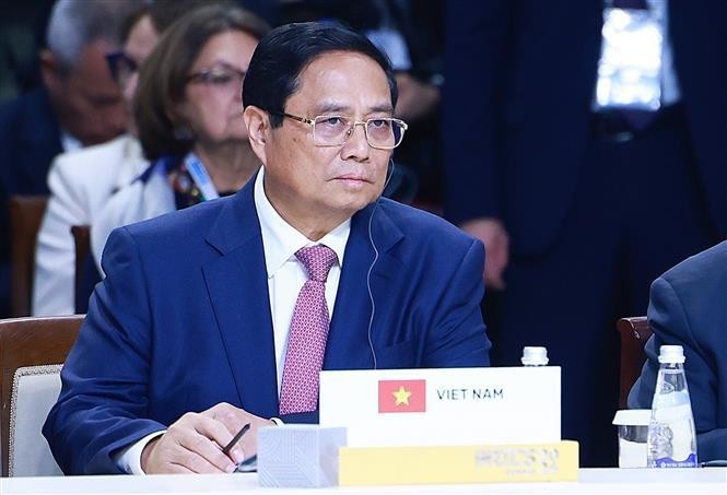 El primer ministro de Vietnam, Pham Minh Chinh, participa en la Cumbre del grupo ampliado de los BRICS. (Fotografía: VNA)