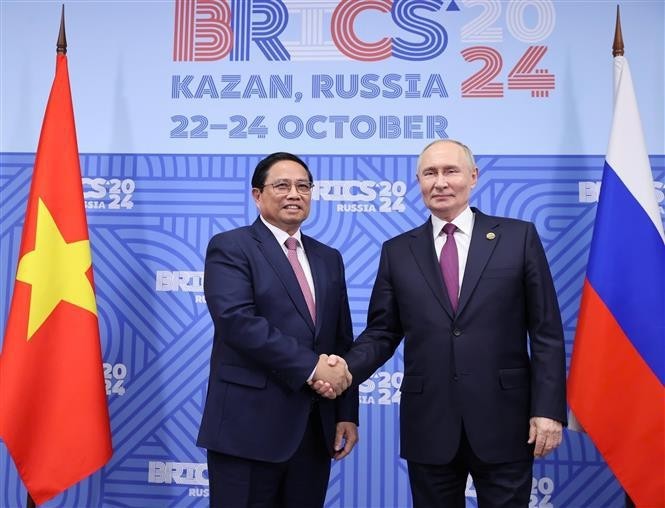 El primer ministro de Vietnam, Pham Minh Chinh, y el presidente de Rusia, Vladimir Putin. (Fotografía: VNA)