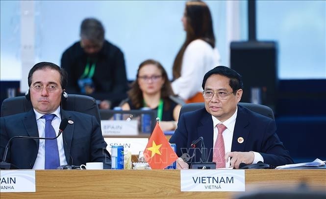 El primer ministro vietnamita, Pham Minh Chinh, participa en una sesión de la Cumbre del G20. (Fotografía: VNA)