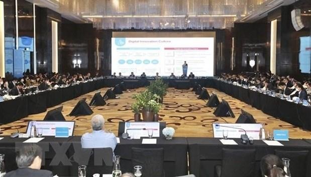 Panorama de una reunión en la Semana Digital Internacional de Vietnam 2022 (Fotografía: VNA)