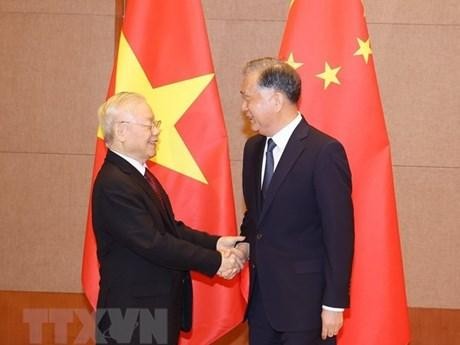 El secretario general del Partido Comunista de Vietnam, Nguyen Phu Trong, y el presidente del Comité Nacional de la Conferencia Consultiva Política del Pueblo Chino, Wang Yang. (Fotografía: VNA)