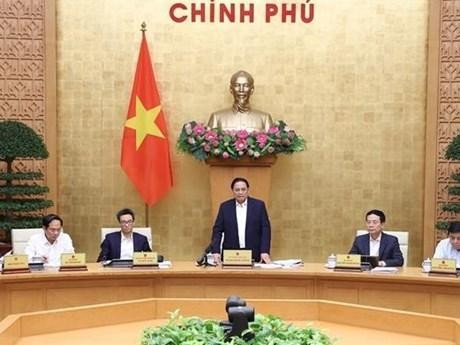 El primer ministro vietnamita, Pham Minh Chinh, presidió la Conferencia nacional en línea sobre la divulgación de políticas en Hanói. (Fotografía: VNA)