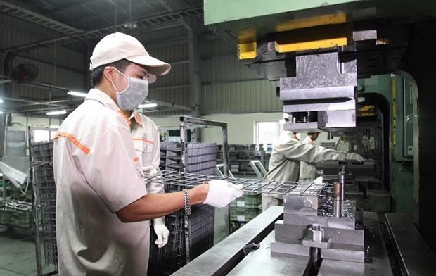 Fabricación mecánica en la empresa Tam Hop en el distrito de Soc Son, Hanói. (Fotografía: hanoimoi.com.vn)