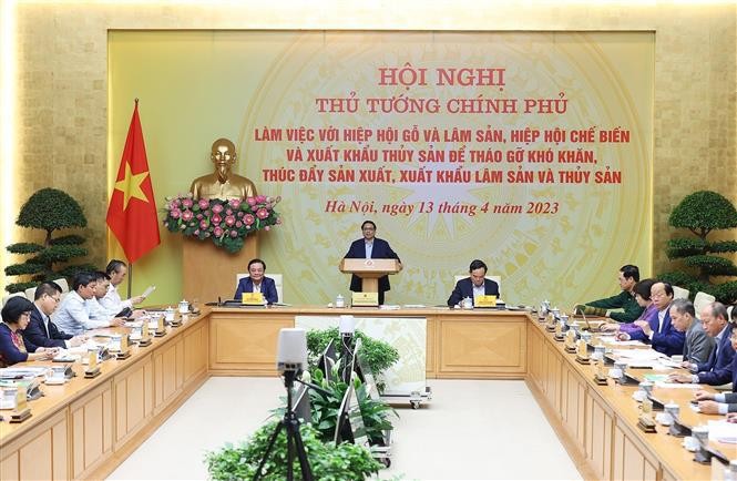 El primer ministro de Vietnam, Pham Minh Chinh, preside la conferencia. (Fotografía: VNA)