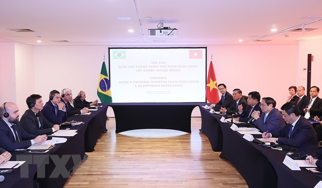Encuentro entre el primer ministro Pham Minh Chinh y las empresas brasileñas. (Fotografía: VNA)