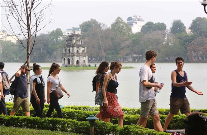 Turistas internacionales en Hanói. 