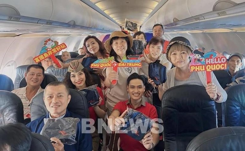 Pasajeros del vuelo de Vietjet a Phu Quoc. (Fotografía: VNA)