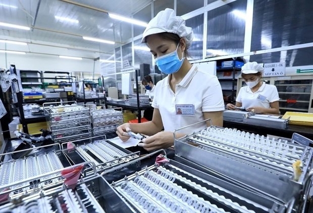 El flujo de inversión extranjera directa en Vietnam ascendió a 36,6 mil millones de dólares en 2023. (Foto: VNA)