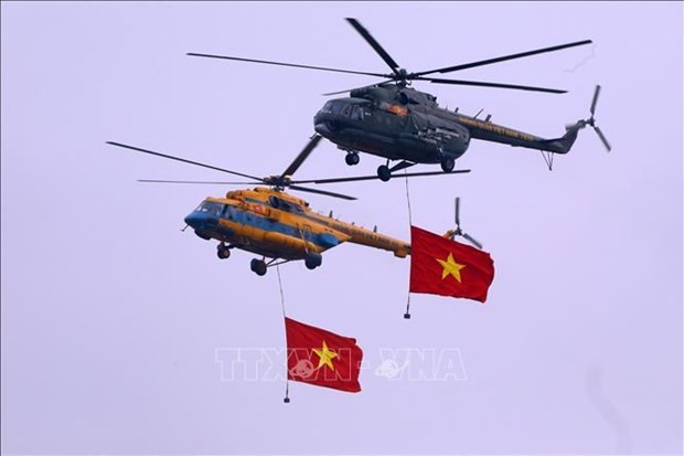 La actuación de helicópteros en la Exhibición de Defensa en 2022. (Foto: VNA)