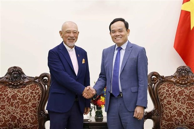 El viceprimer ministro de Vietnam, Tran Luu Quang, (derecha) recibe a Yohei Sasakawa, presidente del Fondo Nippon y el Fondo para la Paz Sasakawa (Foto: VNA)