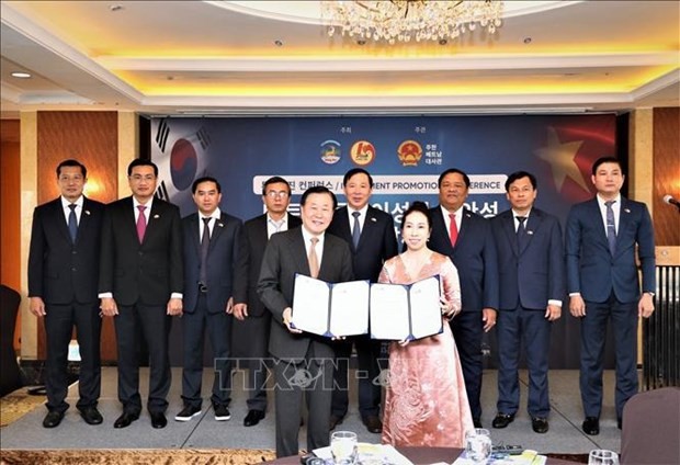 En un acto de firma de cooperación entre empresas de los dos países (Foto: VNA)
