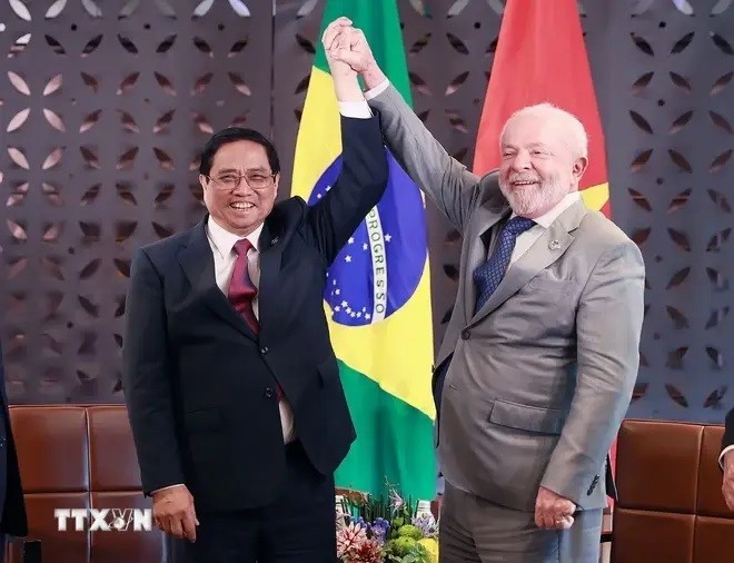 El primer ministro de Vietnam, Pham Minh Chinh y el presidente de Brasil, Luiz Inácio Lula da Silva, el 21 de mayo de 2023. (Foto: VNA)