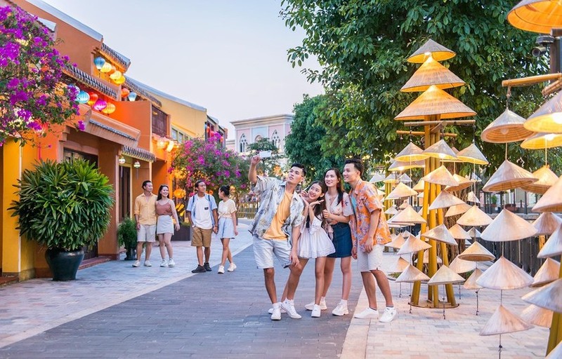 Turistas en Hoi An (Foto: sggp.org.vn)