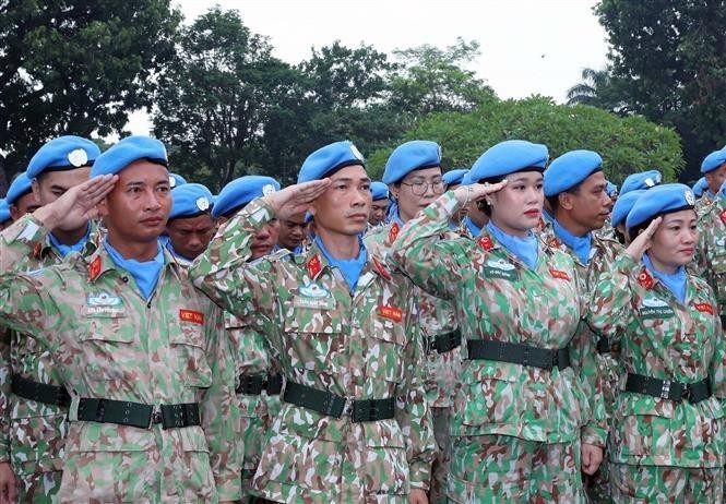 Miembros de equipos militares vietnamitas en el evento. (Foto:VNA)