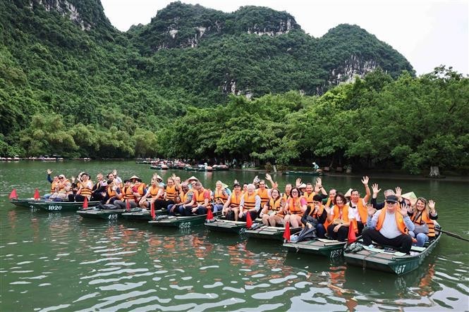 Turistas en el complejo turístico de Trang An. (Foto: VNA)