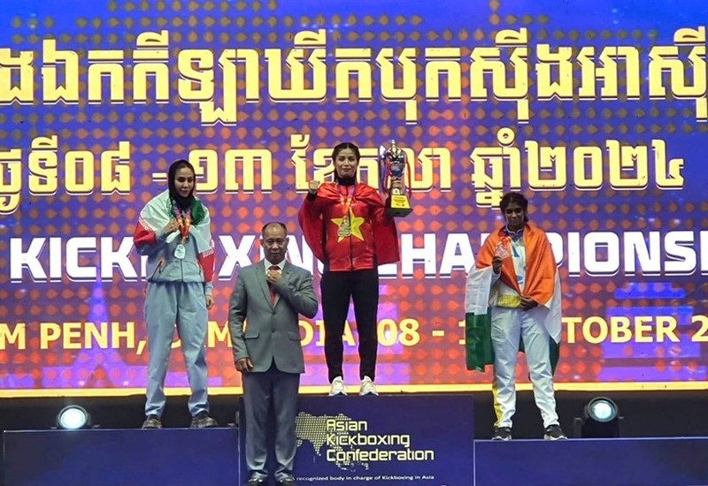 La luchadora Hong Tham brinda la undécima medalla de oro a Vietnam. (Foto: thethaovietnamplus.vn)