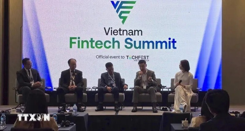 Expertos debaten en un coloquio sobre la tecnología financiera en Techfest Vietnam 2024 (Foto: VNA)