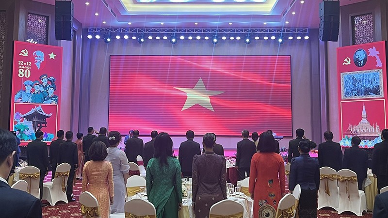 Los delegados de Vietnam y Laos en el evento (Foto: Nhan Dan)