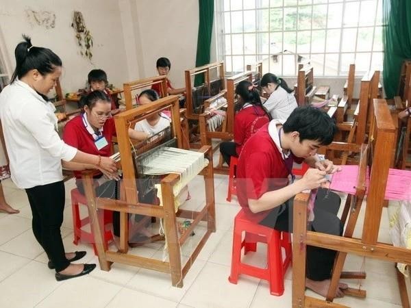 Una clase de capacitación vocacional para los discapacitados (Foto: VNA)