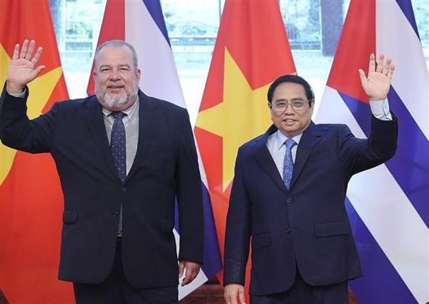 El primer ministro vietnamita, Pham Minh Chinh y su homólogo cubano, Manuel Marrero Cruz. (Fotografía: VNA)