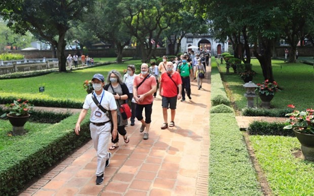 Turistas extranjeros en Hanói (Fotografía: VNA)