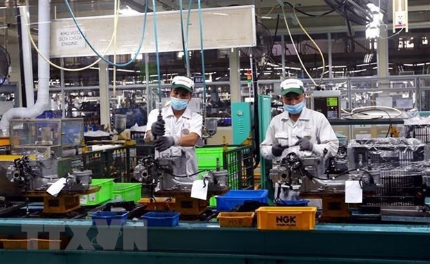 Actividades de producción en la filial del grupo Toyota en Vietnam (Fotografía: VNA)