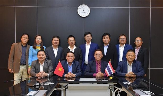 Representantes de las asociaciones de periodistas de Vietnam y Tailandia (Fotografía: VNA)