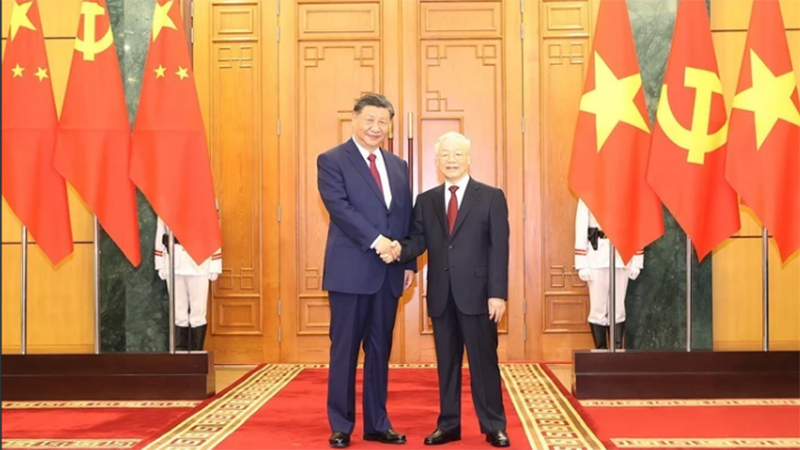 El secretario general del PCV, Nguyen Phu Trong, y el secretario general del Comité Central del PCCh y presidente de China, Xi Jinping.