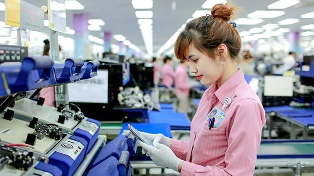 Fabricación de productos electrónicos en la fábrica de Samsung Electronics Vietnam, en la provincia de Thai Nguyen. (Foto: Nhan Dan)