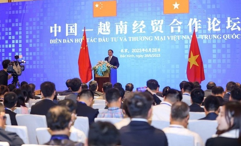En el Foro de Cooperación Comercial y de Inversión Vietnam-China, en Pekín, el 28 de junio. (Foto: baochinhphu.vn)